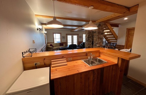 McHenry Casa | Log cabin in forested setting with private hot tub & amazing views, dog-friendly