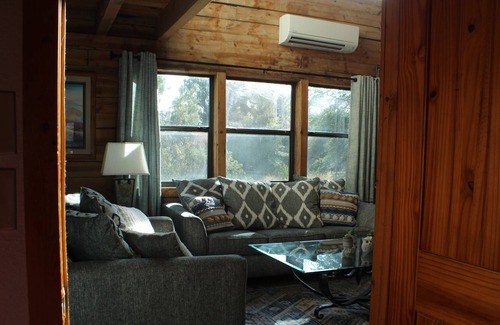 Young Cabina | Log cabin on 2.5 private wooded acres! Bring your horses & ATV's. Hunt area 23