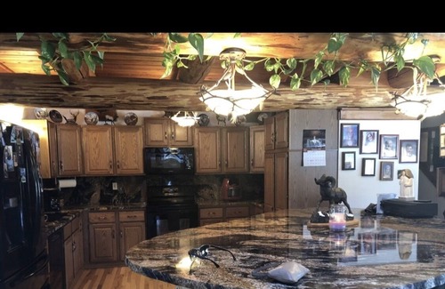 Sheboygan Falls Casa | Log Cabin Style Home on 28 acres of land