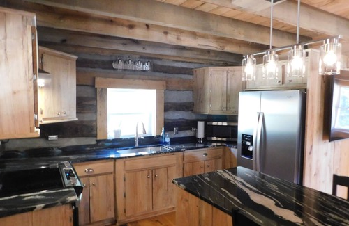 Mount Airy Cabina | Log Cabin with Koi Pond in Mayberry on the “Surry County Wine Trail”