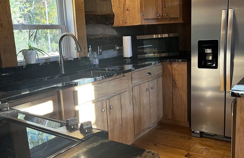 Mount Airy Cabina | Log Cabin with Koi Pond in Mayberry on the “Surry County Wine Trail”