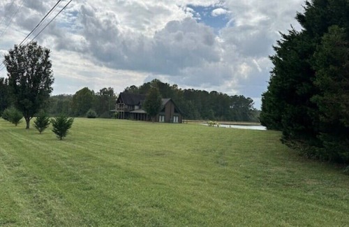 Bowdon Junction Casa | Log Castle and a Spring Fed Lake