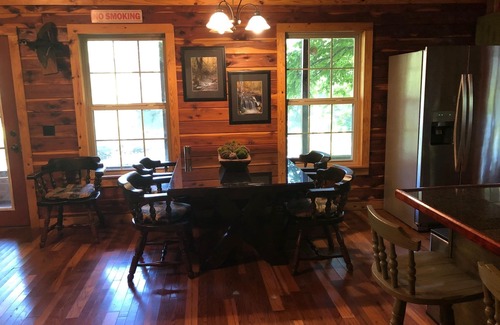 Heber Springs Cabaña | Log Cottage on the Little Red River with hot tub.