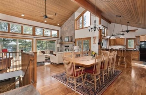 Windermere Cabaña | Log home & guest cottage in old forest, Waterfall, Sunsets, Sauna, Fishing Boat