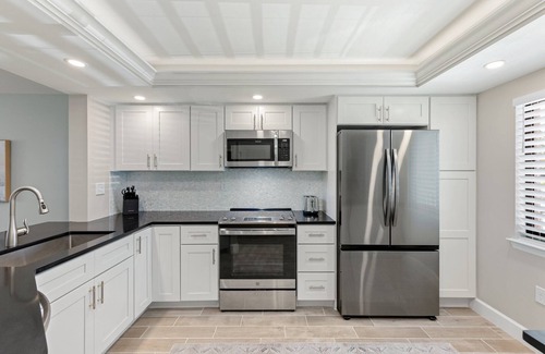 Sanibel Condominio | Loggerhead Cay 411 beautifully designed steps to beach!