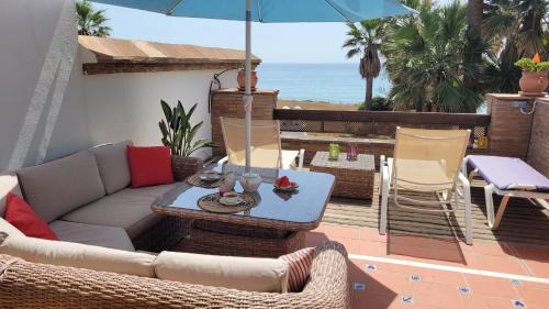 San Roque Villa | Loma del Rey 56 - casa primera linea de mar