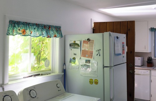 Traverse City Cabaña | Long Lake Cozy Stone Cottage - Frontage - 4 Kayaks - Fire pit - Pet friendly