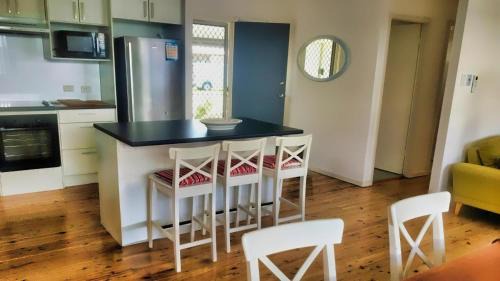 Blacksmiths Casa | Longshore Drift - metres to Blacksmiths Beach