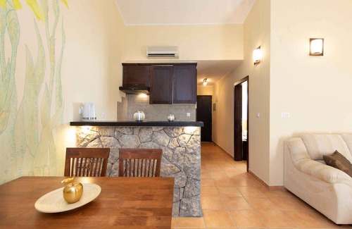 Brzac Apartamento | Lotus Resort vacation apartment with swimming pools and garden as well as children's playground and parking lot surrounded by greenery and forest
