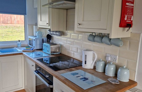 Dartmouth Chalet De Esquí | Lovely 2 bedroom chalet sleeps 6 in Dartmouth WIFI Electric inc Pet friendly.