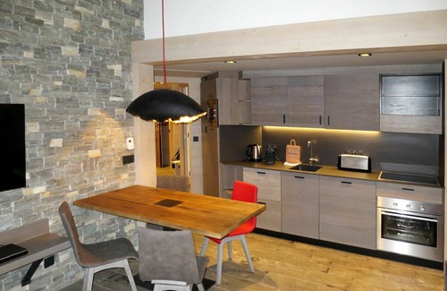 Val-d'Isere Apartamento | Hermoso apartamento para 4 personas con jacuzzi, piscina, WIFI, TV, balcón y aparcamiento