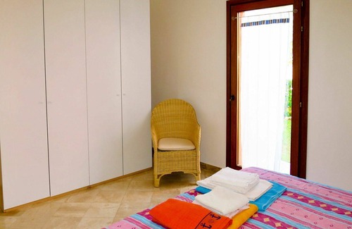 Porto Pozzo Apartamento | Lovely apartment for 4 guests with pool, WIFI, A/C, terrace, pets allowed and parking