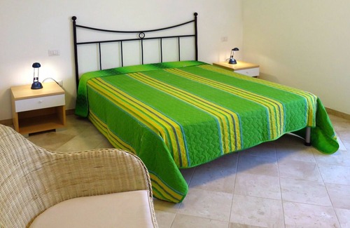 Porto Pozzo Apartamento | Lovely apartment for 4 guests with pool, WIFI, A/C, terrace, pets allowed and parking