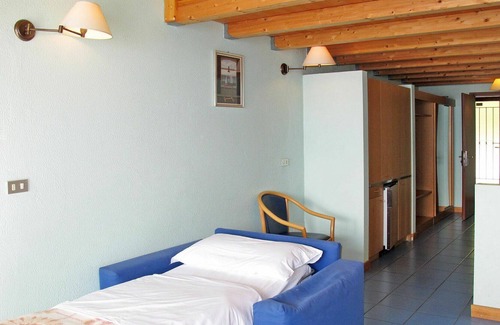 Limone sul Garda Apartamento | Lovely apartment for 4 guests with pool, WIFI, hot tub, A/C, TV, terrace and parking