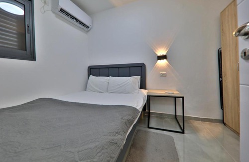 Haifa Apartamento | Lovely apartment with a terrace in the center of Haifa