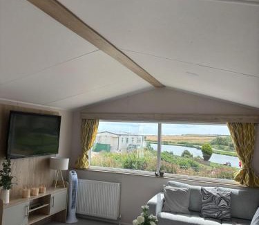 Winestead Otro | Lovely Caravan With Full Lake Views And Decking In Yorkshire, Ref 71010Q