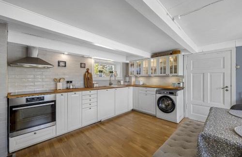 Amli Casa | Lovely Farmhouse By Nidelva With Sauna And Hot Tub
