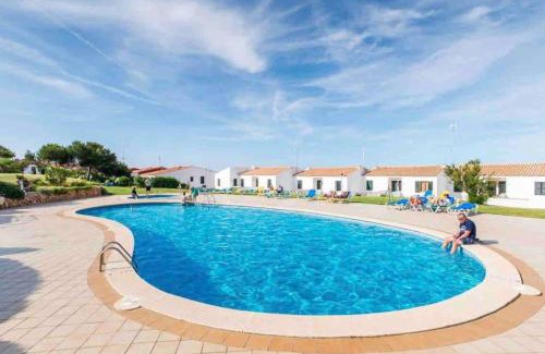 Arenal d'en Castell Apartamento | Lovely hideaway with pool and white sand beach
