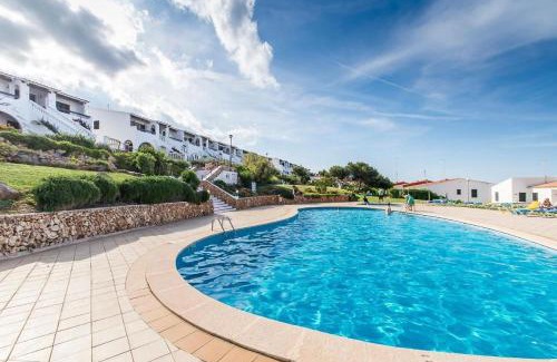 Arenal d'en Castell Apartamento | Lovely hideaway with pool and white sand beach