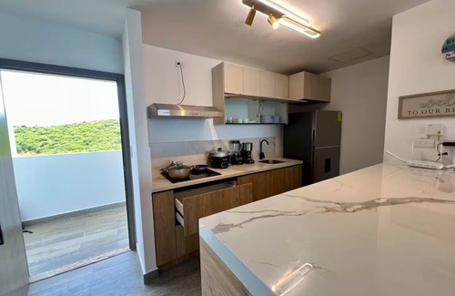 Playas Condominio | Lujoso Departamento con vista al mar