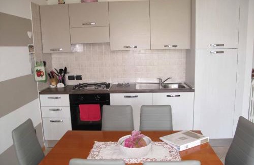 Rivoltella Apartamento | Luminoso Trilocale con Piscina e Giardino privato