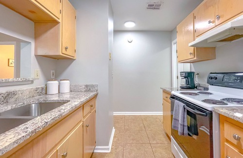 Tallahassee Casa | Reopening - Renovated - The cozy white townhouse!