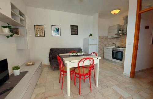 Lido di Pomposa Apartamento | Almuerzo con una vista impresionante! Apartamento en primera línea de playa en el centro de Lido di Pomposa