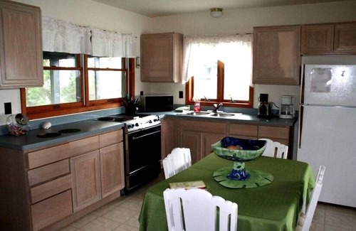 Wolcott Cabaña | Señuelo Cottage, justo en la haya. Palmeras, lancha motora gratuita.