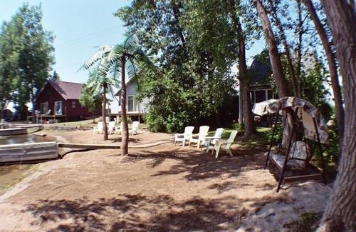 Wolcott Cabaña | Señuelo Cottage, justo en la haya. Palmeras, lancha motora gratuita.