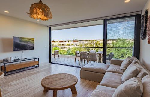 Playacar Apartamento | Lush Escape at Awa Playacar
