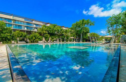 Playacar Apartamento | Lush Escape at Awa Playacar