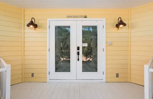 Palm City Casa | Lush Waterfront Pool Home and Pool house with Pickleball court and Boat dock