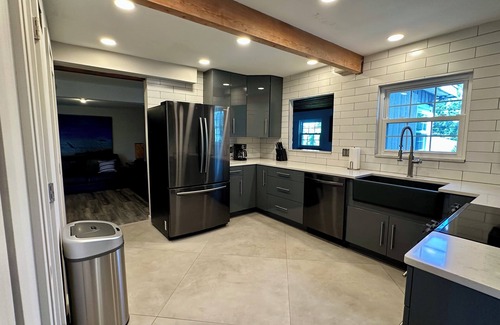 Shore Acres Casa | Luxe 4BR 2.5B Treetop Beach Escape Sleeps 10 Near #1 Beaches & Downtown St. Pete