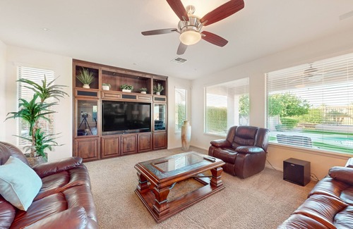 Seville Casa | Luxe snowbird-friendly haven with heated pool, gas fireplace, balcony, & firepit