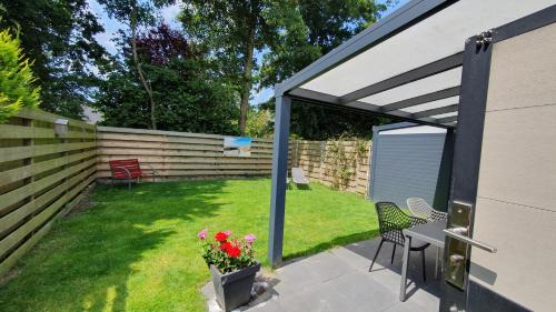 Dirkshorn Casa | Luxe zomerwoning met omheinde tuin voor hond en kinderen