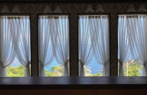 Hamada Casa | Luxrious double room with mountain view and ocean view from the balcony and an interior window/Hamada Shimane