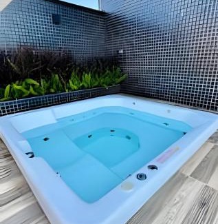 Hugo Lange Apartamento | Luxuoso Loft com Garagem, Ar cond. Jacuzzi e Wifi
