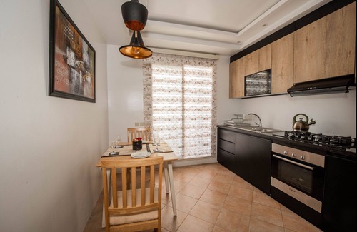 Nouaceur Apartamento | Lujoso Apartamento Nouaceur Cerca del Aeropuerto con Vista al Jardín