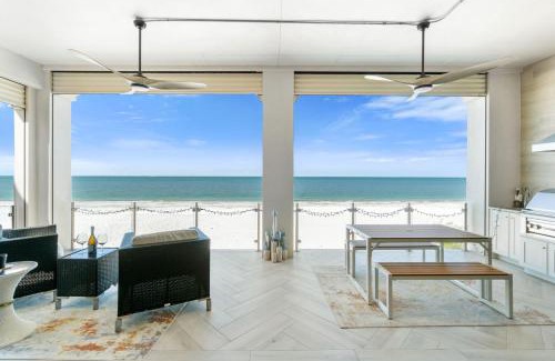 Mid Island Casa | Luxurious Beachfront Vacation Getaway, 4 Bedroom, 4 and half Bath w Heated Pool, Spa, Sleeps 12