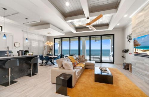 Mid Island Casa | Luxurious Beachfront Vacation Getaway, 4 Bedroom, 4 and half Bath w Heated Pool, Spa, Sleeps 12