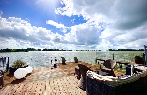 Onderdijk Casa | Lujosa casa de vacaciones directamente en el lago
