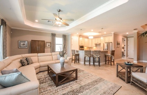 Naples Casa | Luxurious lakeview pool home in 5 Star Fiddler's Creek. Outdoor Dining & Kitchen
