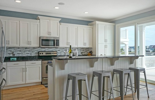 Sunset Beach Casa | Luxurious Sunset Beach Home On The Water With Pool, Boat Dock and Golf Cart