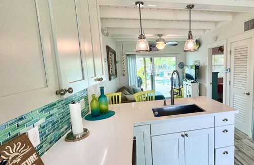 Key Colony Beach Casa | Luxurious Waterfront Oasis: 2BR, Private Heated Pool, Tiki, Dock