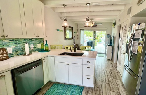 Key Colony Beach Casa | Luxurious Waterfront Oasis: 2BR, Private Heated Pool, Tiki, Dock