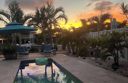 Key Colony Beach Casa | Luxurious Waterfront Oasis: 2BR, Private Heated Pool, Tiki, Dock