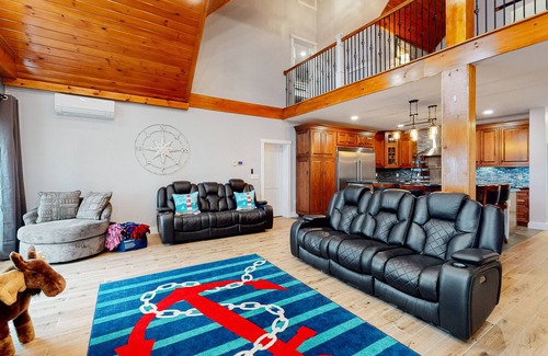 Boothbay Casa | Luxurious waterfront home with deck, firepit, hot tub, fireplace, & pool table