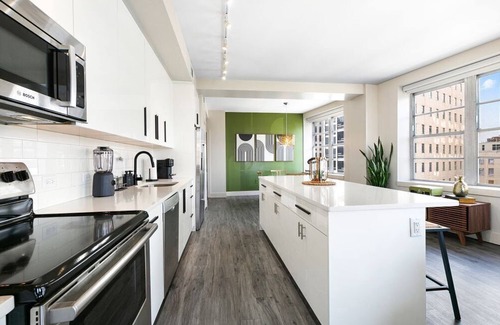 Central Business District Hotel | Luxury 2-Bedroom Condo Steps Away from the French Quarter