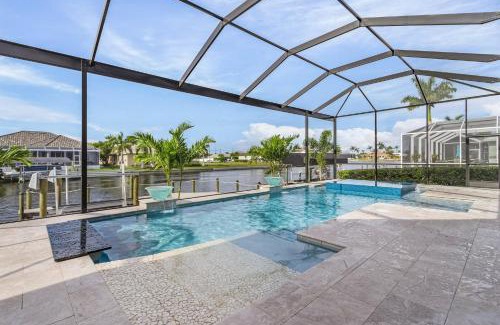 Pelican Casa | Luxury and Opulence - Gulf Access, Heated Pool & Spa, Custom Outdoor Kitchen - Villa Sunseeker
