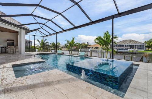 Pelican Casa | Luxury and Opulence - Gulf Access, Heated Pool & Spa, Custom Outdoor Kitchen - Villa Sunseeker